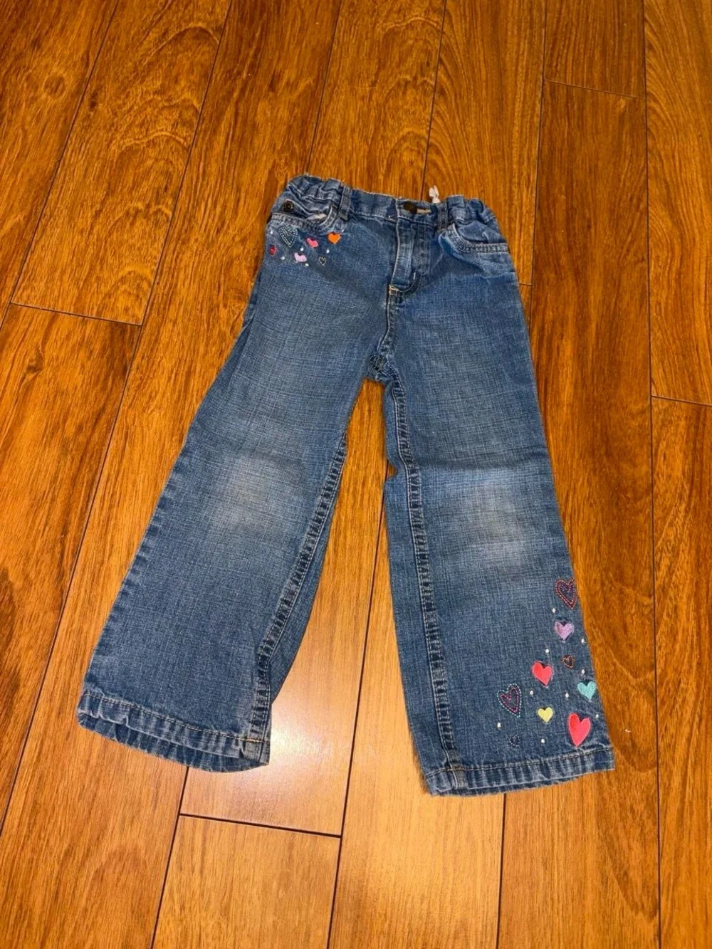 Y2K denim jeans with embroidered hearts
